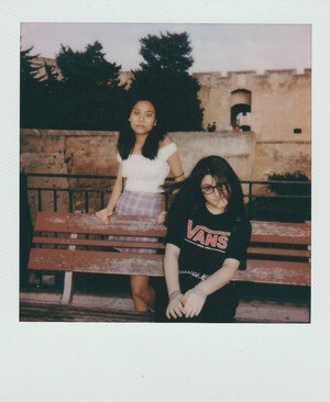 andrea_riondino--2_women_sitting_on_bench--unsplash.jpg