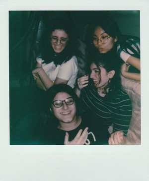 andrea_riondino--3-women-smiling-and-standing--unsplash.jpg