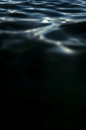 tim_mossholder--a_picture_of_a_body_of_water_at_night--unsplash.jpg